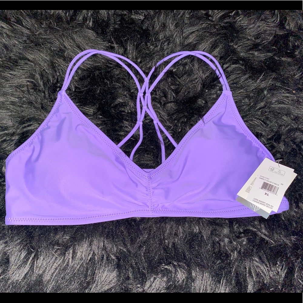 New with tags Volcom Lavendar bikini top.